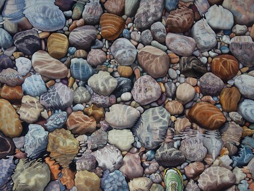watercolour painting of rocks in a stream