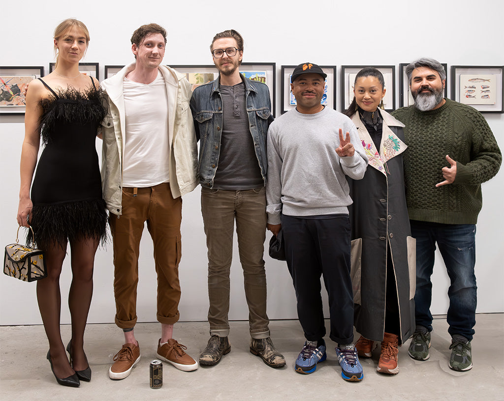 Group photo of Spoke Art artists and the Spoke Art Director during the opening reception of The Moleskine Project XII in San Francisco