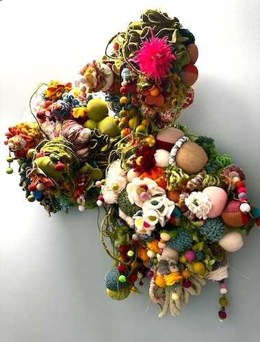 fiber art sculptural floral wall piece
