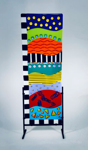 bold and vibrant whimsical fused glass sculpture