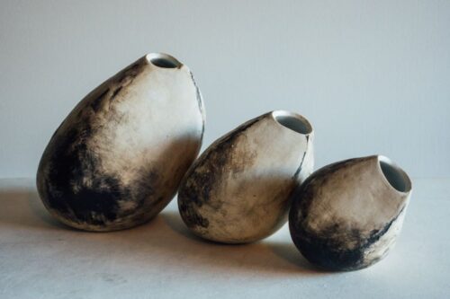 handbuilt ceramic vessels with a rustic appearance