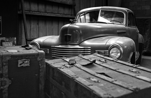 black and white photo of a vintage car
