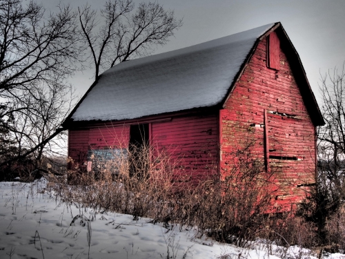 dramatic fine art photograph of a red barn