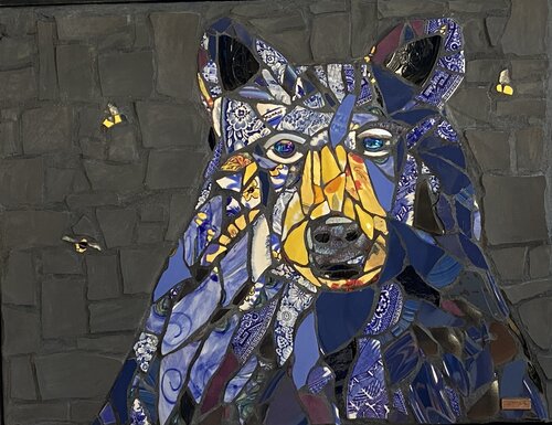 mosaic art design of a bear and bees