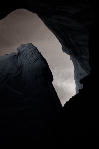 dark and moody fine art photo of a cave