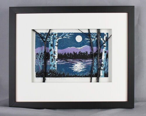 linocut of birches framed in shadow box