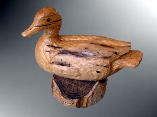 handcarved sculpture of a mallard