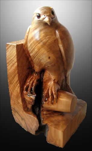 handcarved wooden sculpture of a hawk