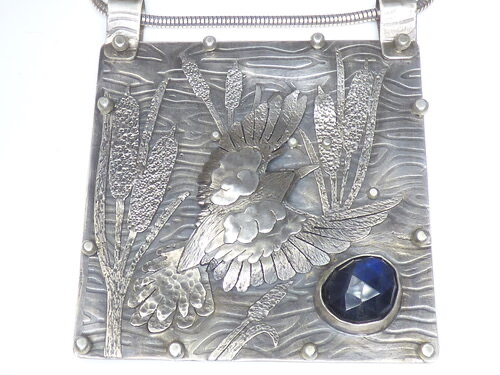 blackbird themed handmade argentium silver pendant