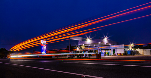 photo of a roadhouse at night