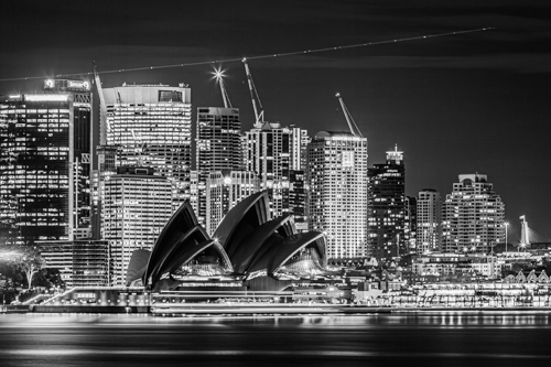 black and white nighttime photo of Sydney Harbour
