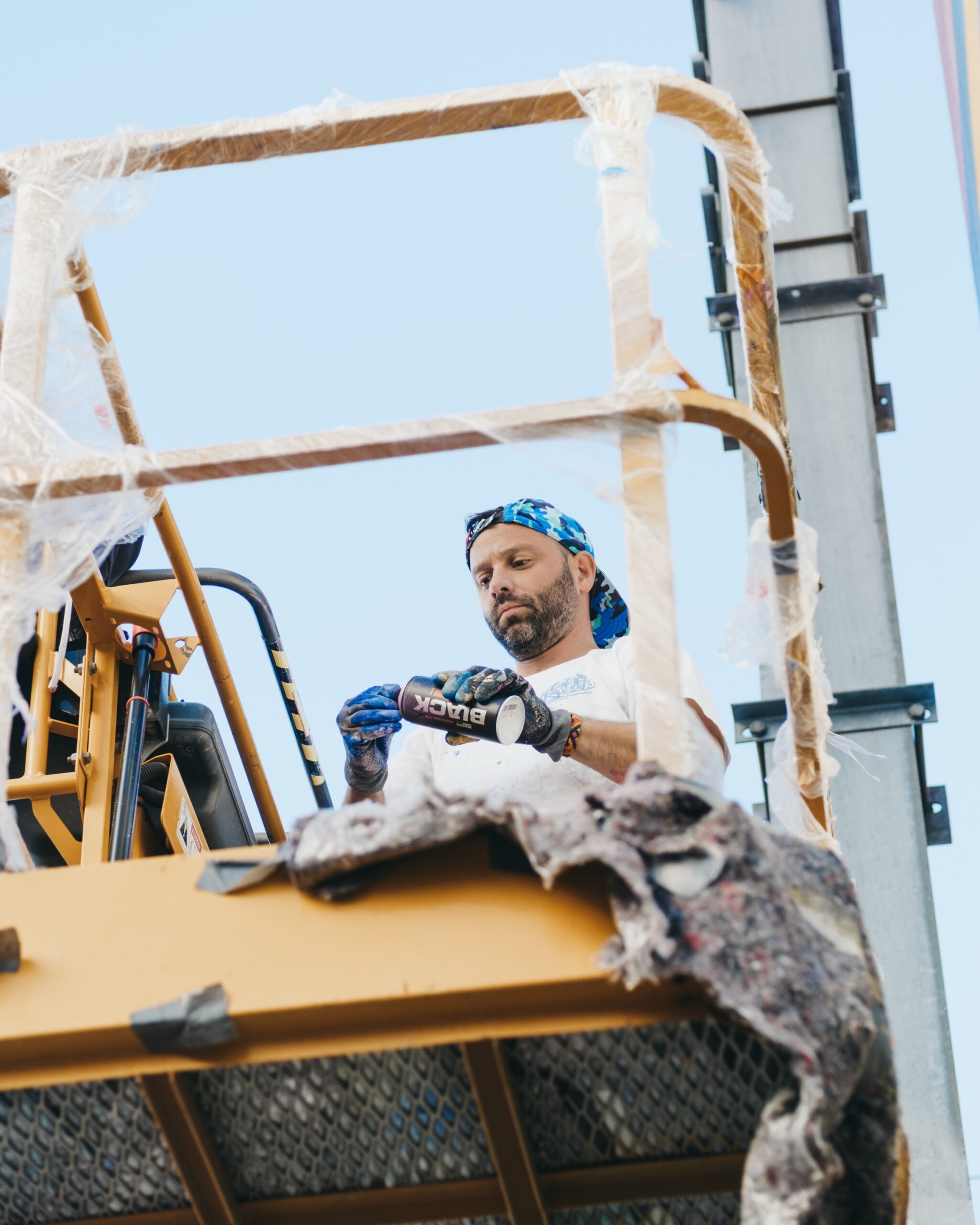 Photo by Calle Libre Street Art on September 24, 2026. May be an image of forklift, crane, headscarf and text.