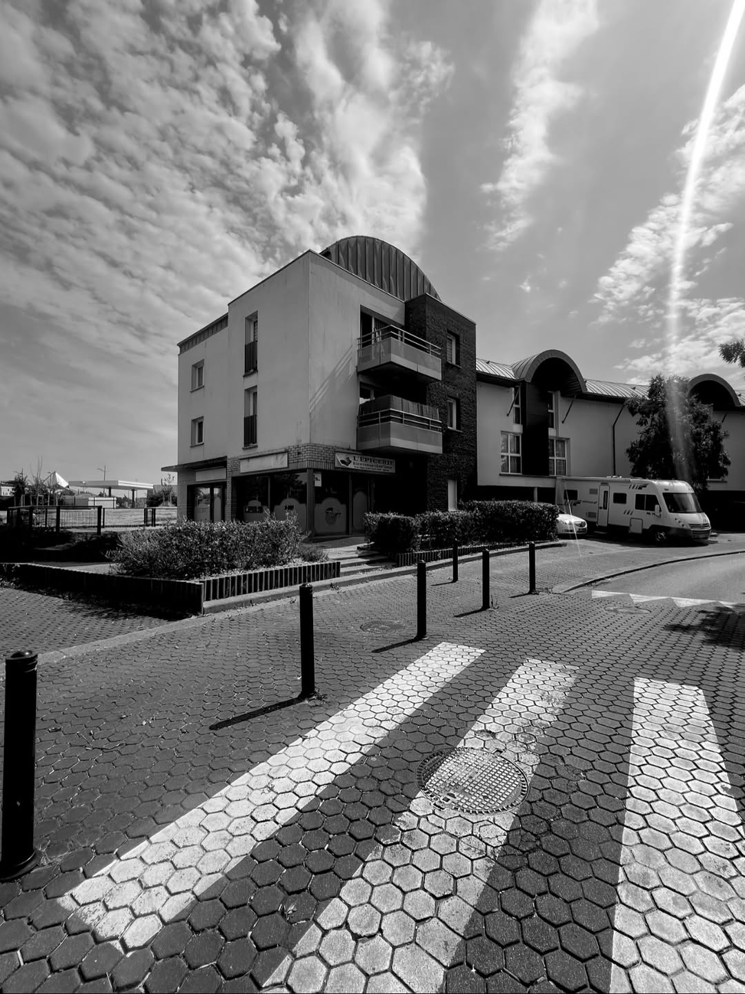 Photo by ΤEΜΡONOK on August 14, 2026. May be a black-and-white image of street, buildings and text.