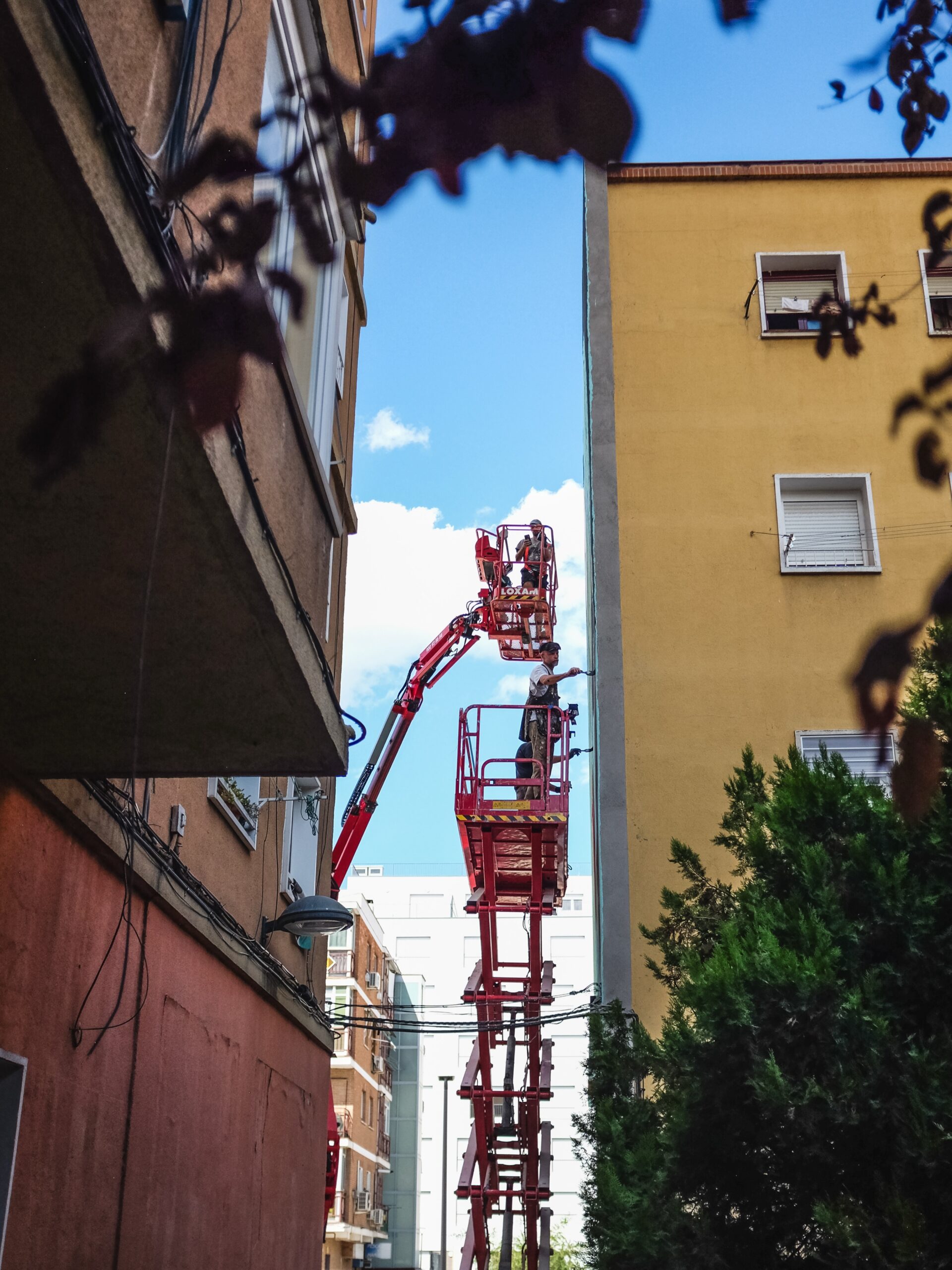 Photo by DFace on September 30, 2026. May be an image of fire escape, crane, ladder, slide, tower, buildings, telephone pole and text.