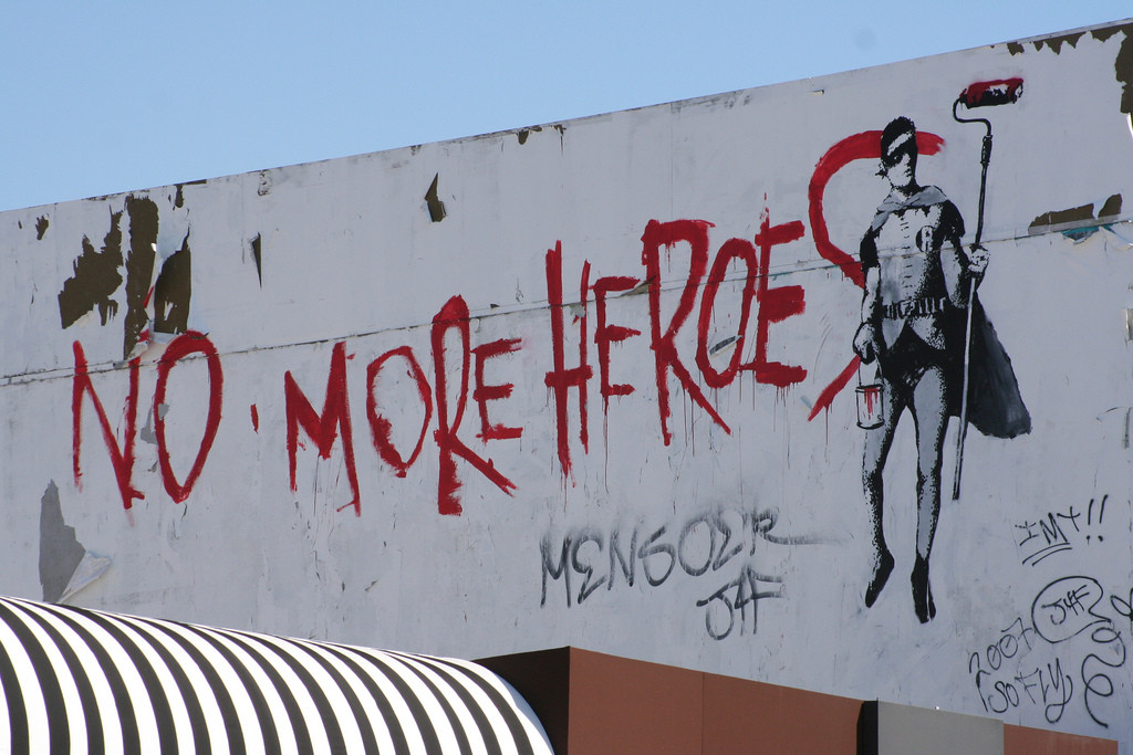 Banksy No More Heroes red lettering and Robin figure on a Los Angeles wall