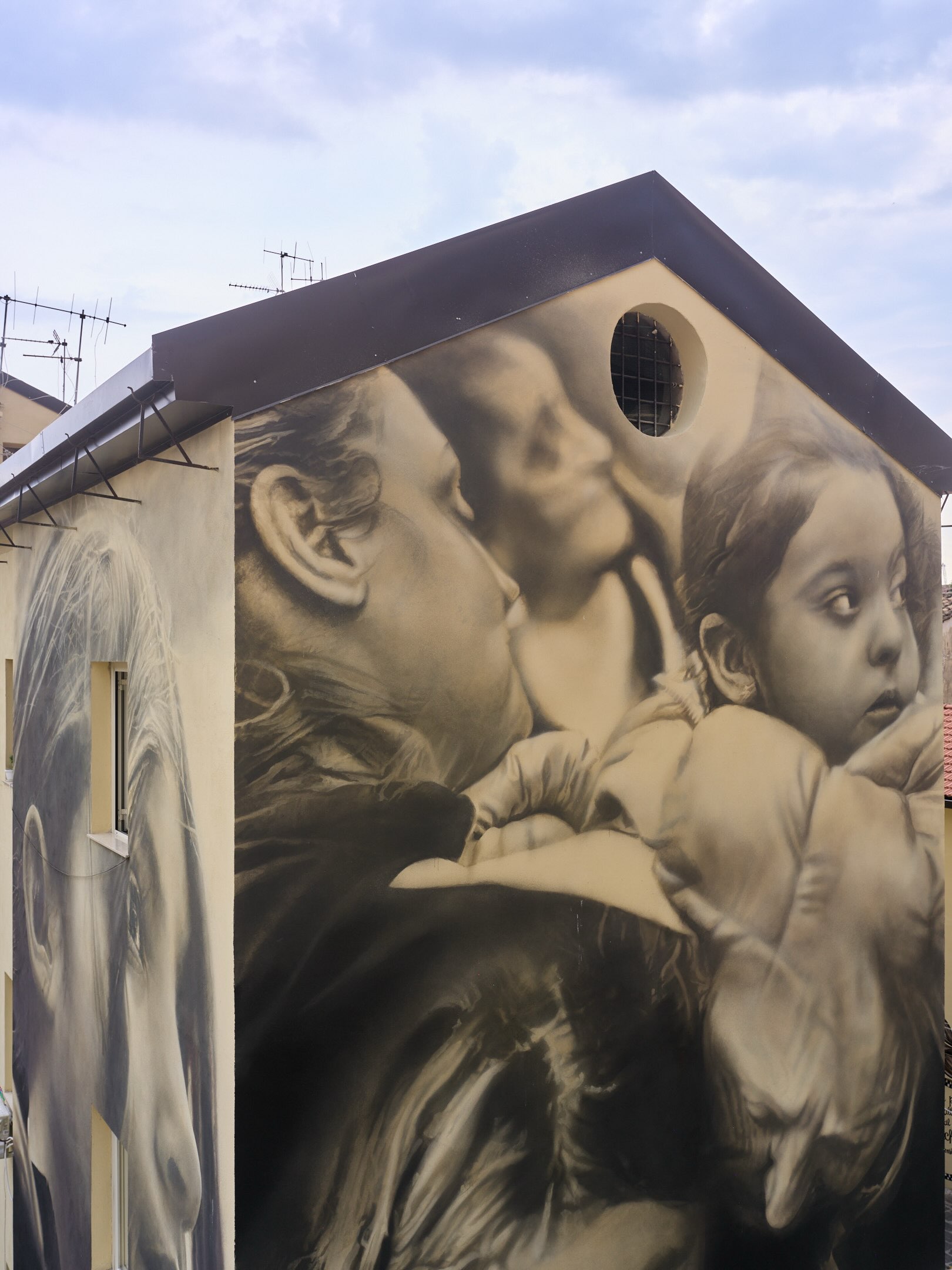 Photo by Guido van Helten on October 01, 2026. May be an image of text.
