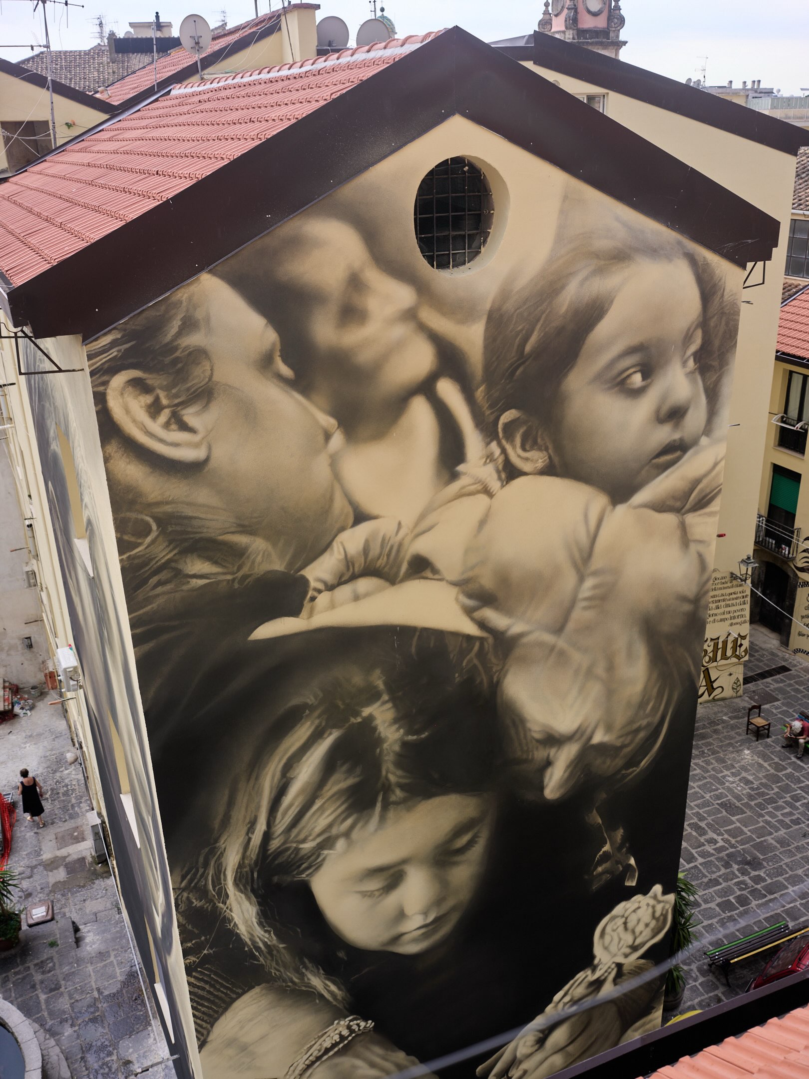 Photo by Guido van Helten on October 01, 2026. May be an image of tower, buildings and text.