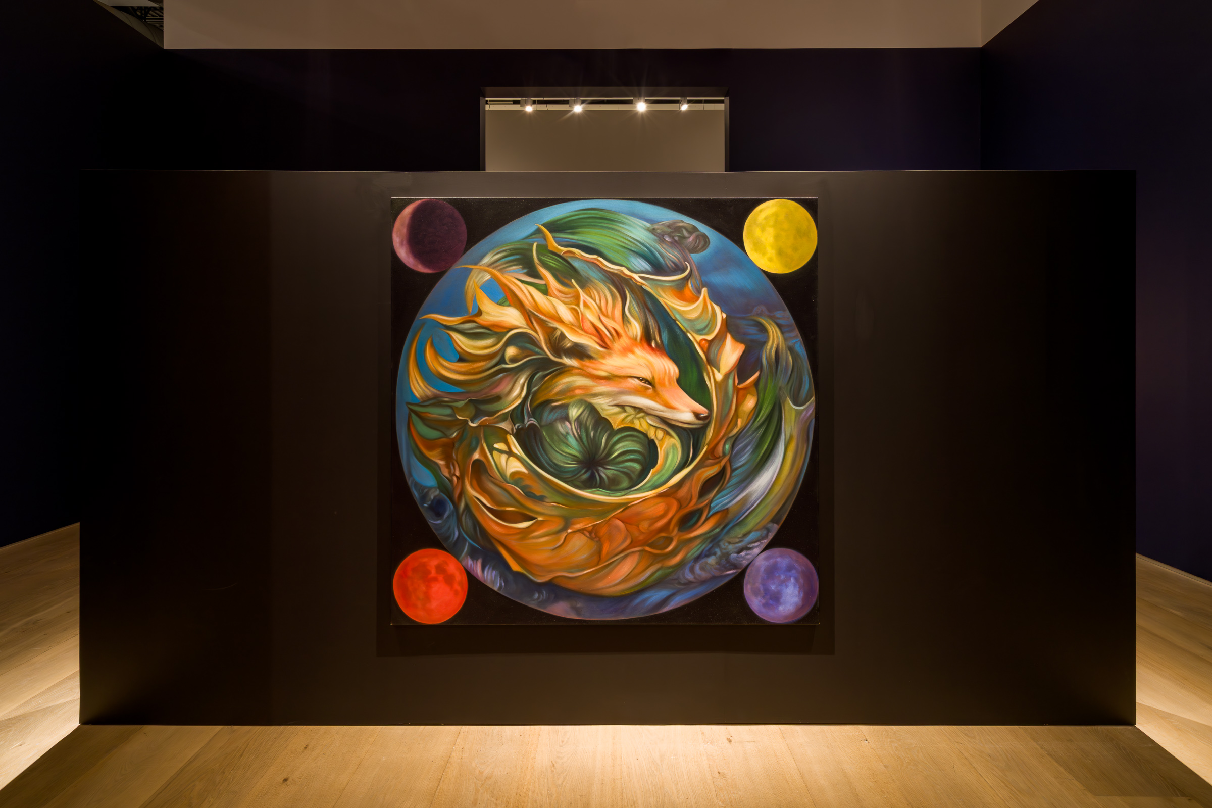 A fox and swirling landscape in a painting displayed on a dark gallery wall